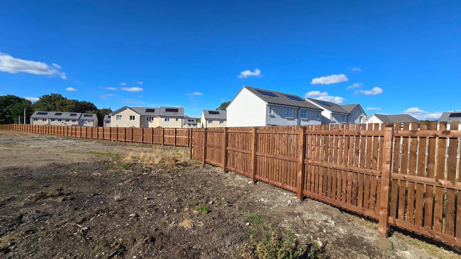 Wooden slat fence installation